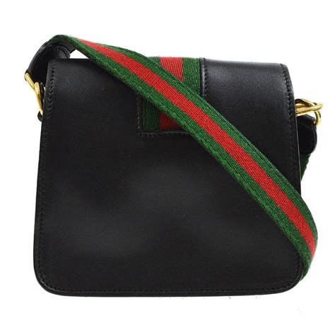 gucci crossbody red|Gucci crossbody with striped strap.